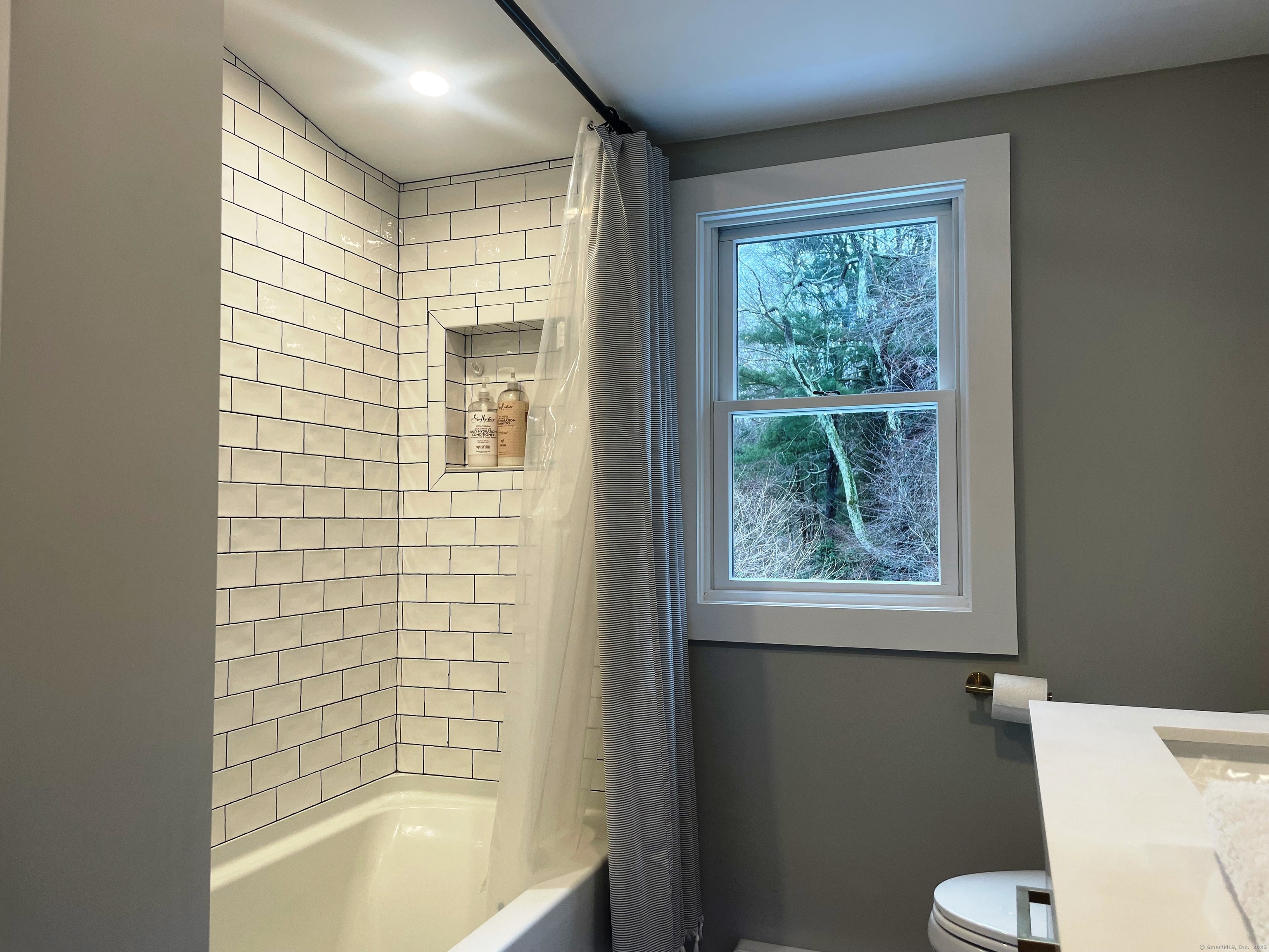 12 Little Gull Lane Groton, CT 06355 - Photo 20 of 25 a bathroom with a bathtub and shower