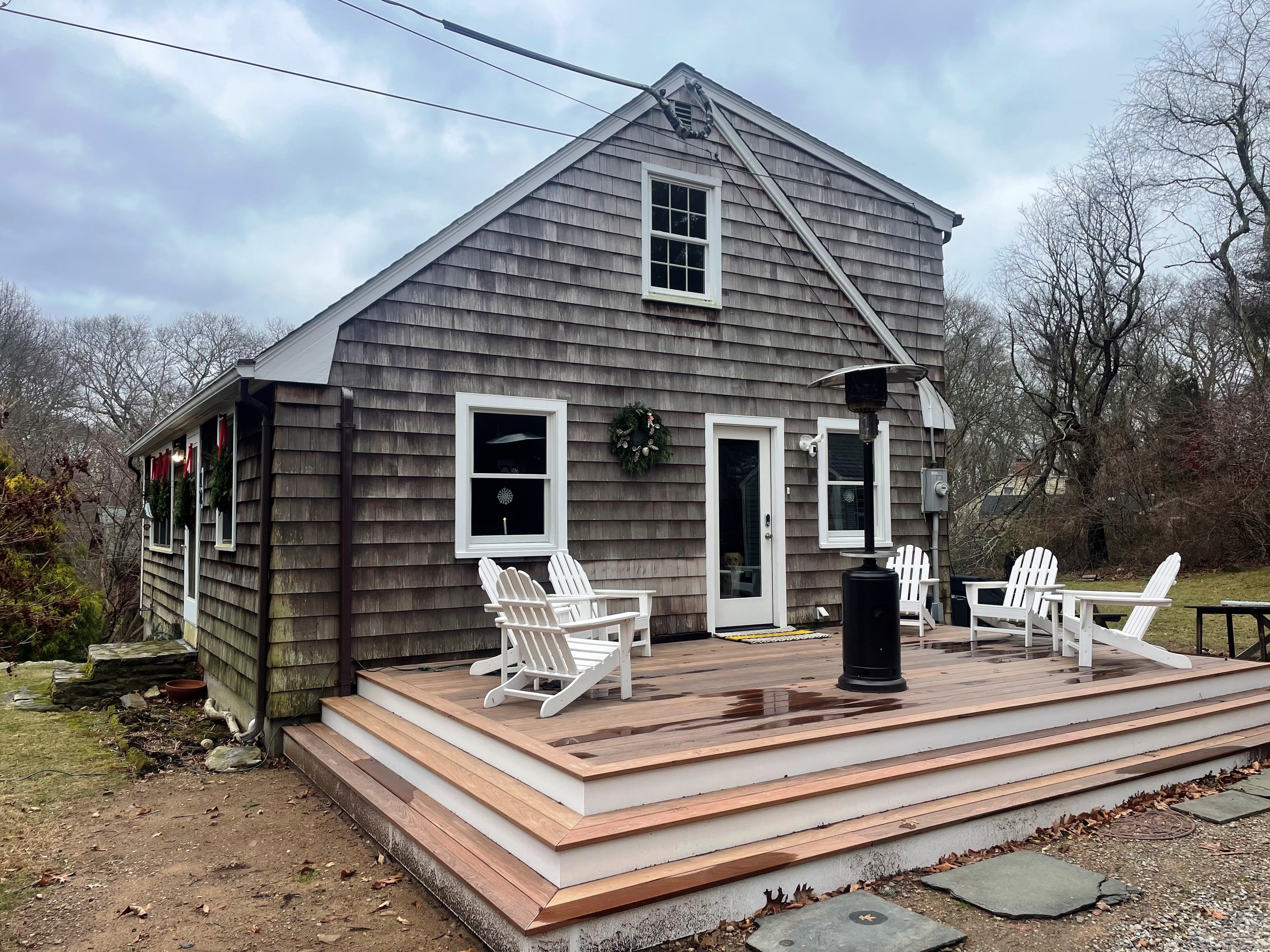12 Little Gull Lane Groton, CT 06355 - Photo 2 of 25 a view of house with outdoor seating
