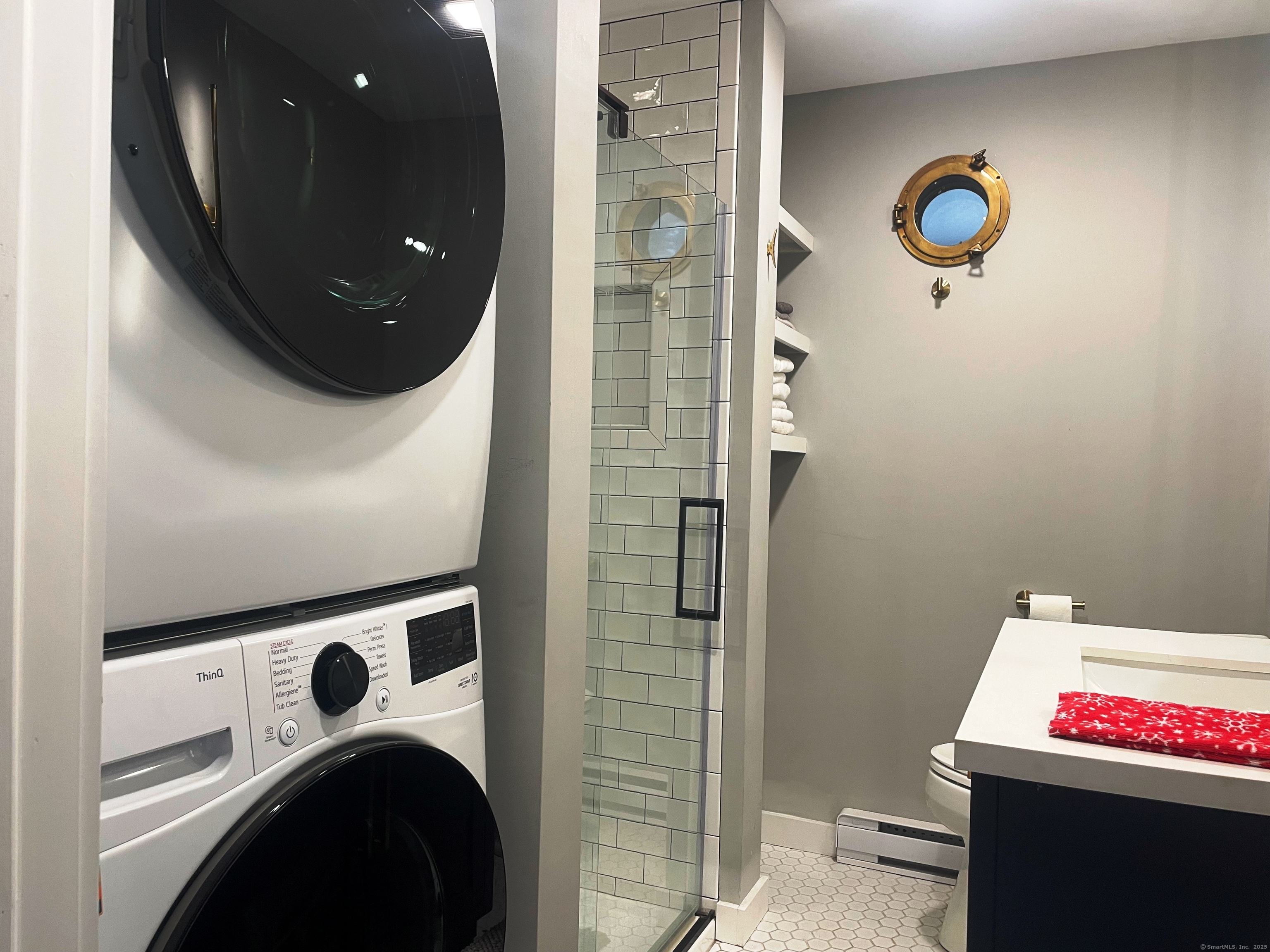 12 Little Gull Lane Groton, CT 06355 - Photo 23 of 25 a bathroom with a granite countertop shower and a sink