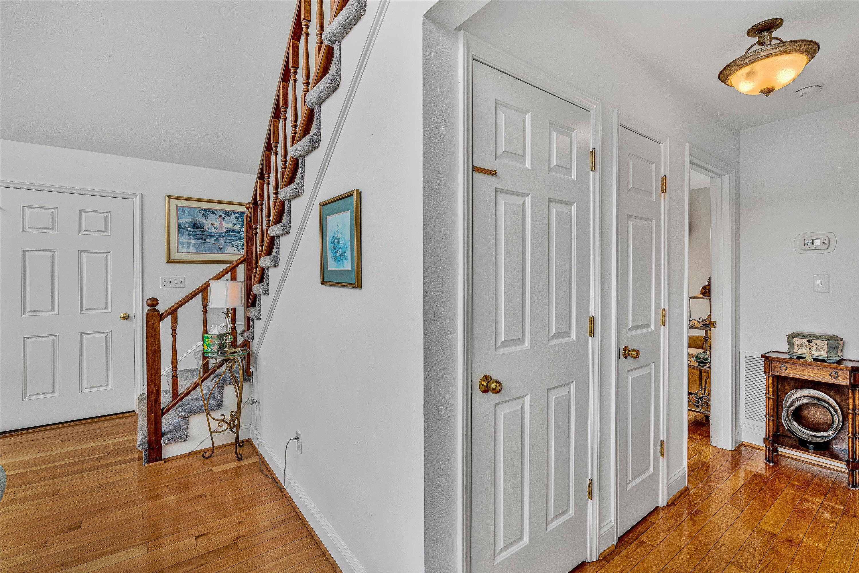 540 Cedar Ridge Road Union Hall, VA 24176 - Photo 18 of 46 a view of a hallway with wooden floor and staircase