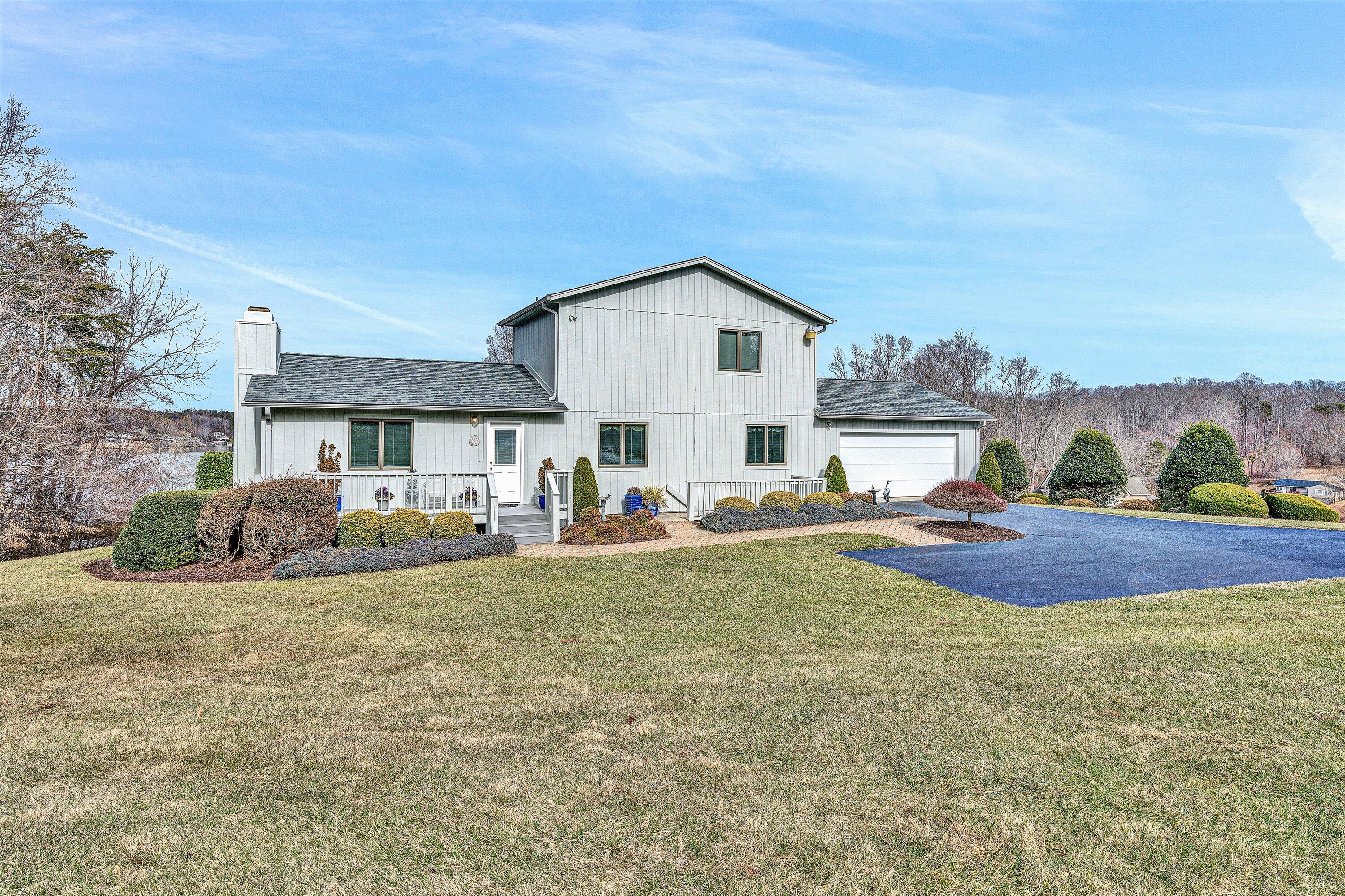 540 Cedar Ridge Road Union Hall, VA 24176 - Photo 3 of 46 a view of a house with backyard and porch