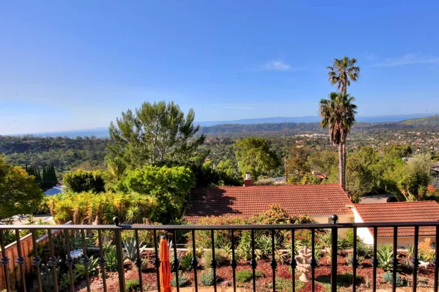 a view of a balcony with an outdoor space