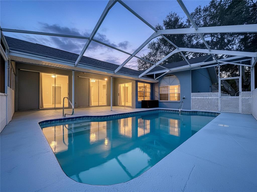 18812 Bascomb Lane Hudson, FL 34667 - Photo 6 of 57 a view of a swimming pool