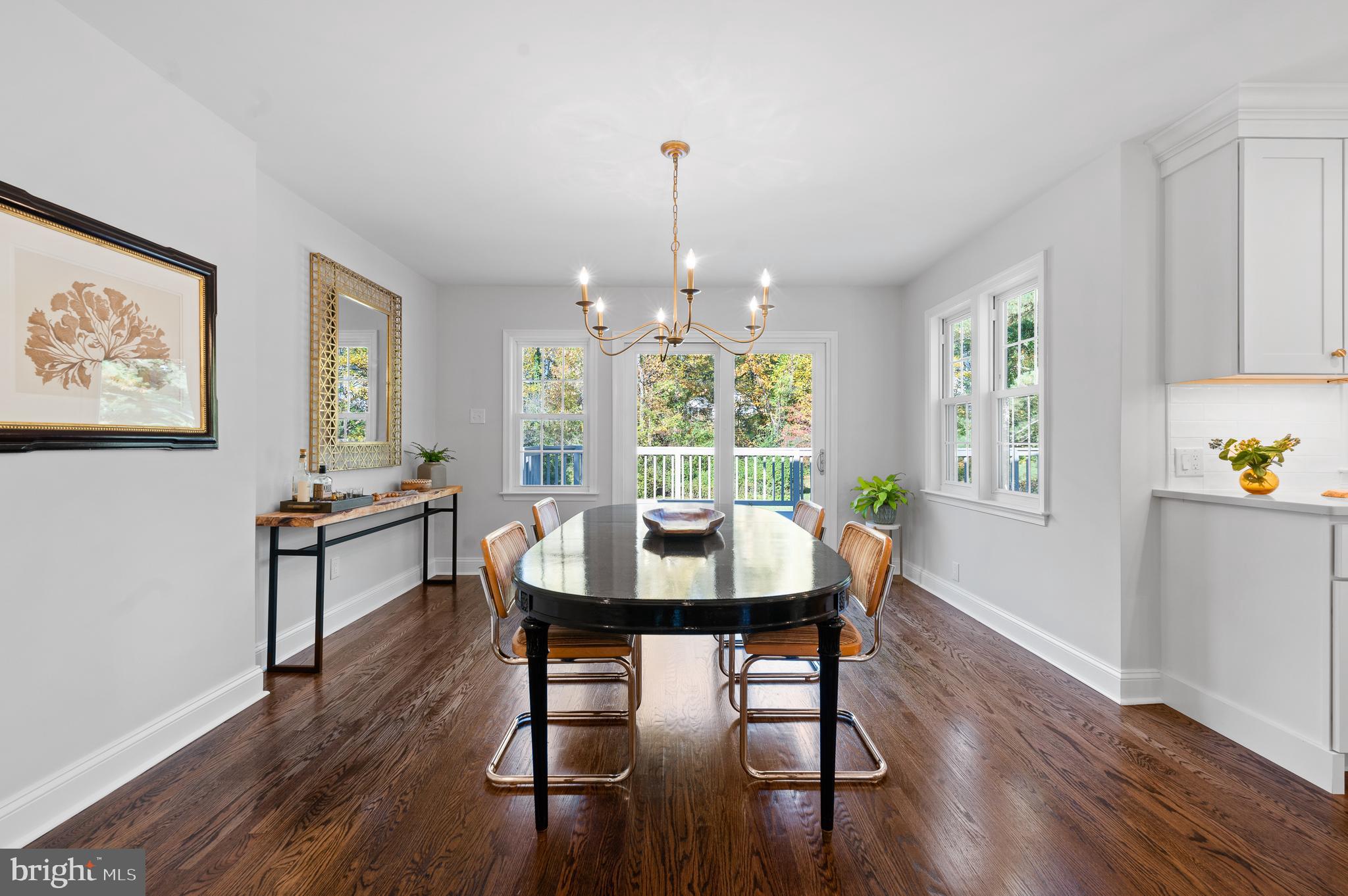 190 Woodstock Road Villanova, PA 19085 - Photo 18 of 52 Glass doors in dining room open to deck outside