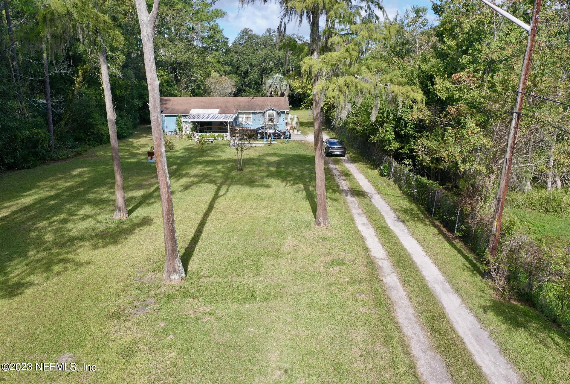 2158 Parental Home Road Jacksonville, FL 32216 - Photo 1 of 18 a view of yard from deck
