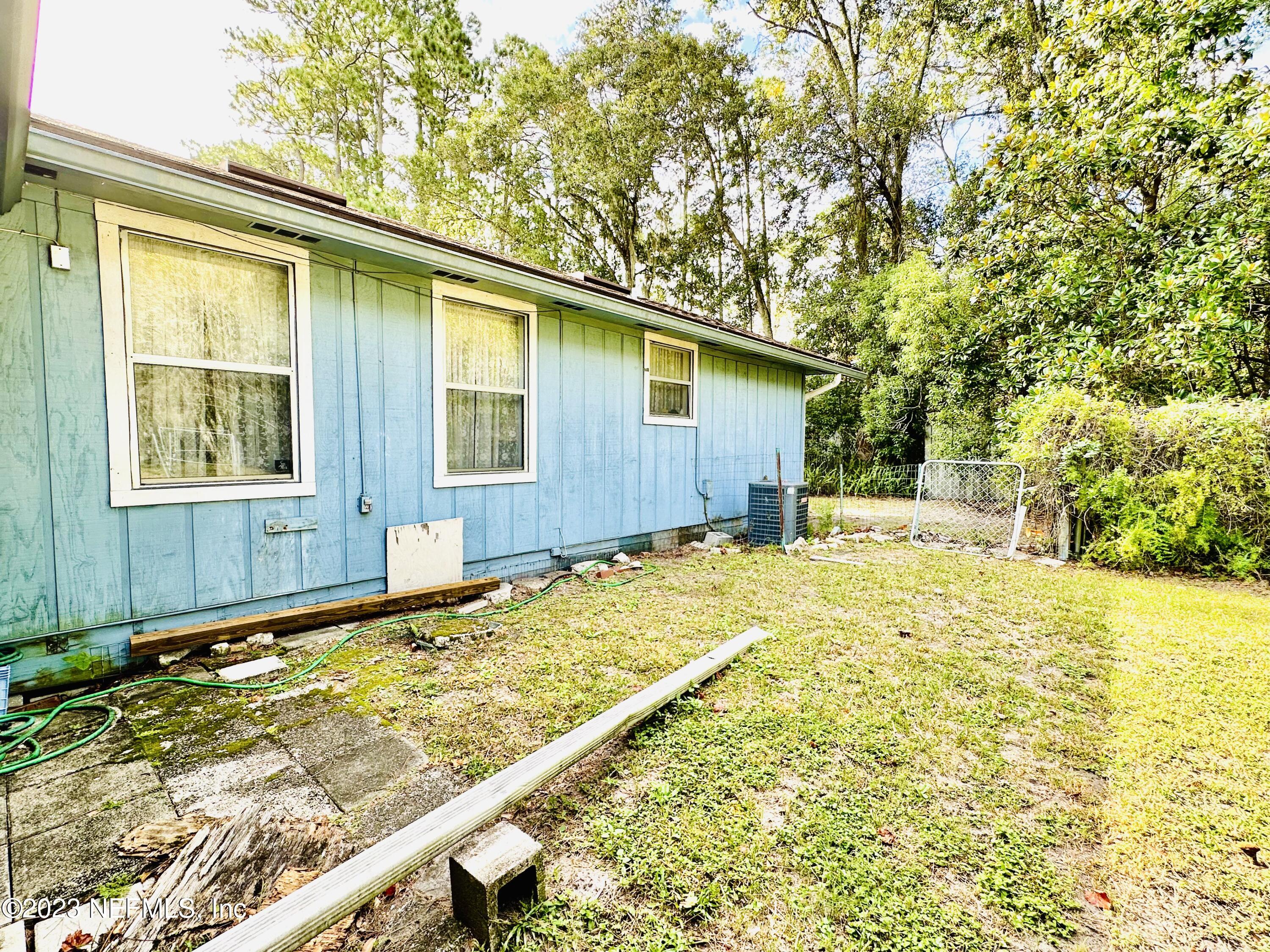 2158 Parental Home Road Jacksonville, FL 32216 - Photo 11 of 18 a view of an house with backyard