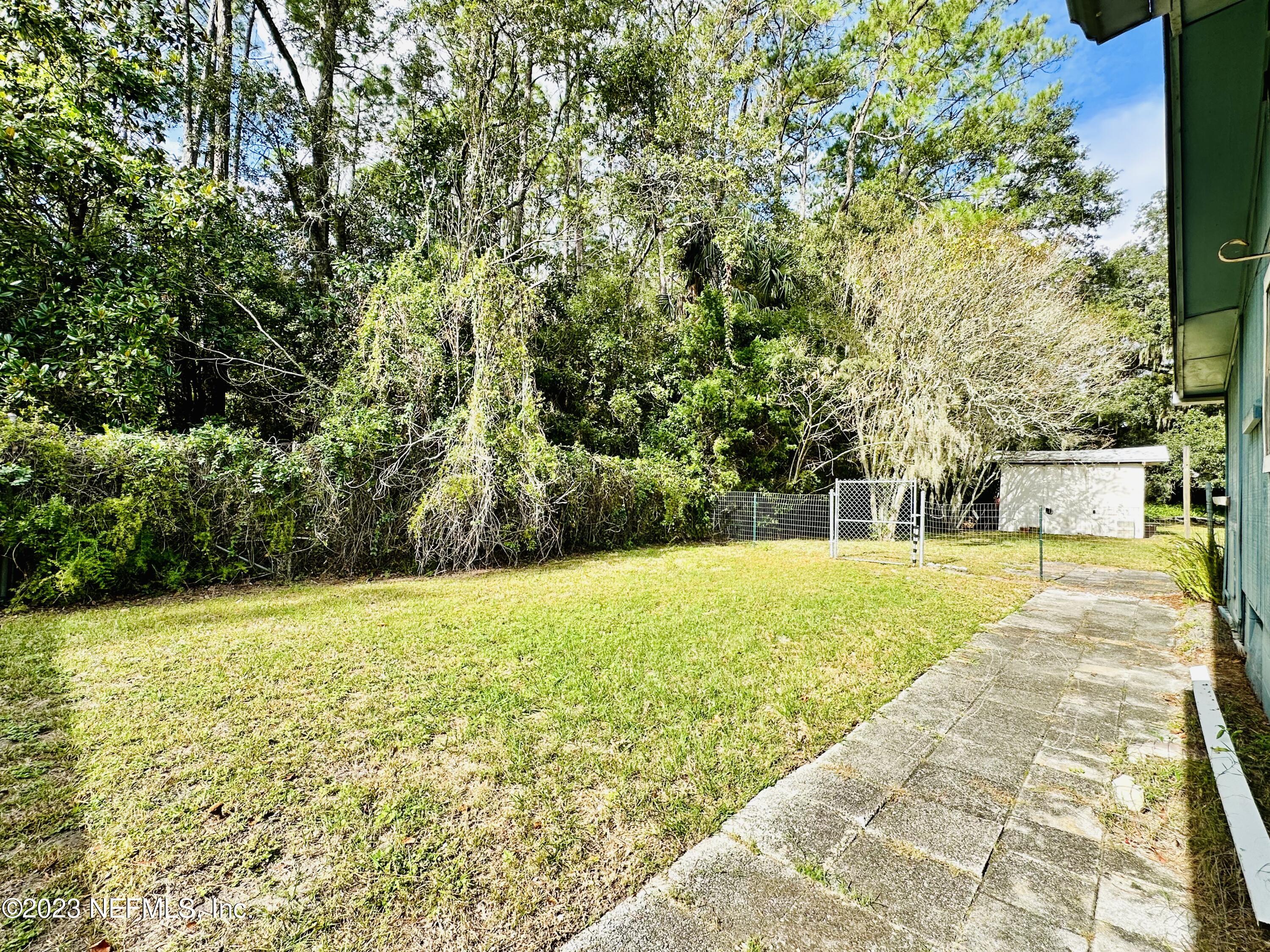 2158 Parental Home Road Jacksonville, FL 32216 - Photo 12 of 18 a view of yard with large trees