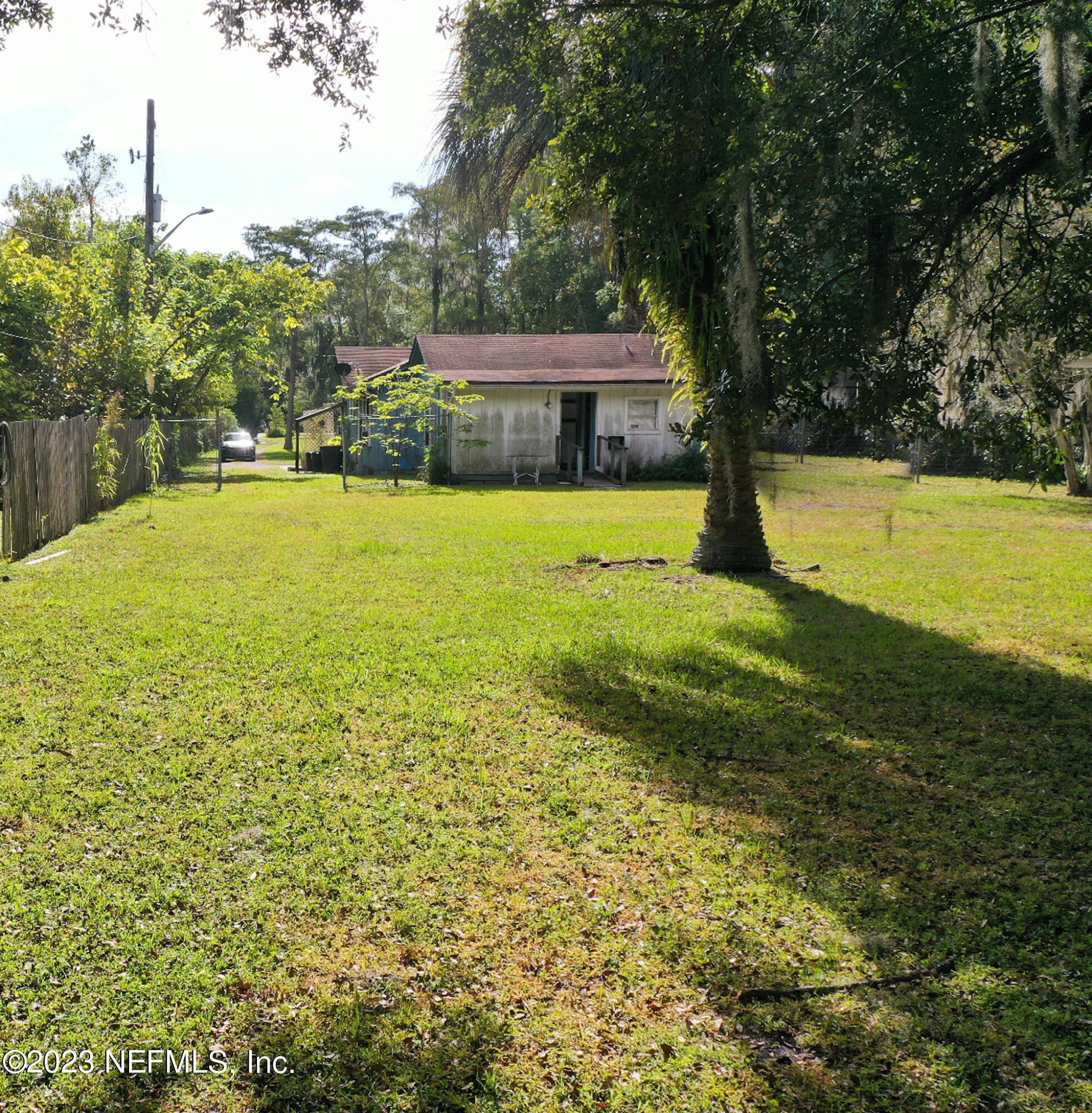 2158 Parental Home Road Jacksonville, FL 32216 - Photo 15 of 18 a view of a house with a yard