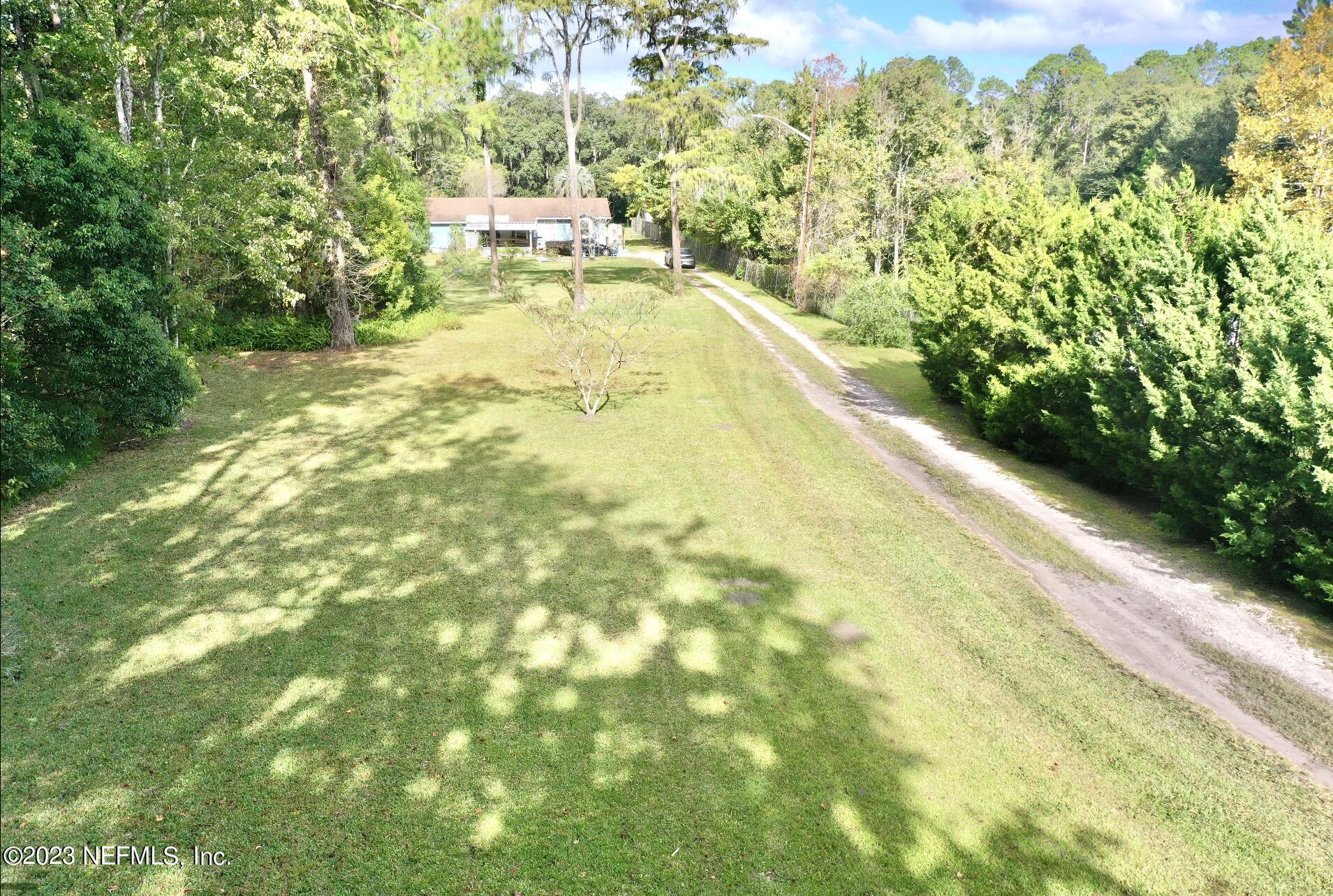 2158 Parental Home Road Jacksonville, FL 32216 - Photo 17 of 18 a bathroom with a bathtub
