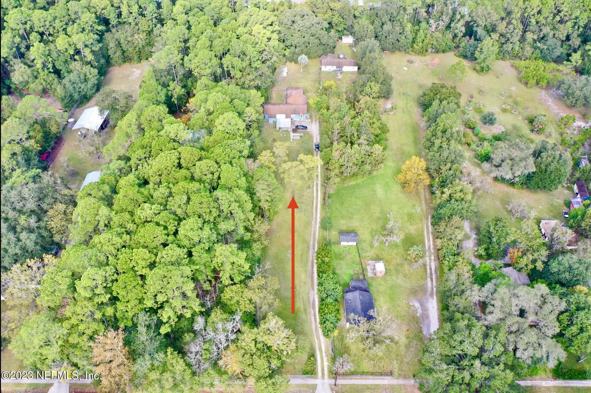 2158 Parental Home Road Jacksonville, FL 32216 - Photo 2 of 18 a multi story tree with yard