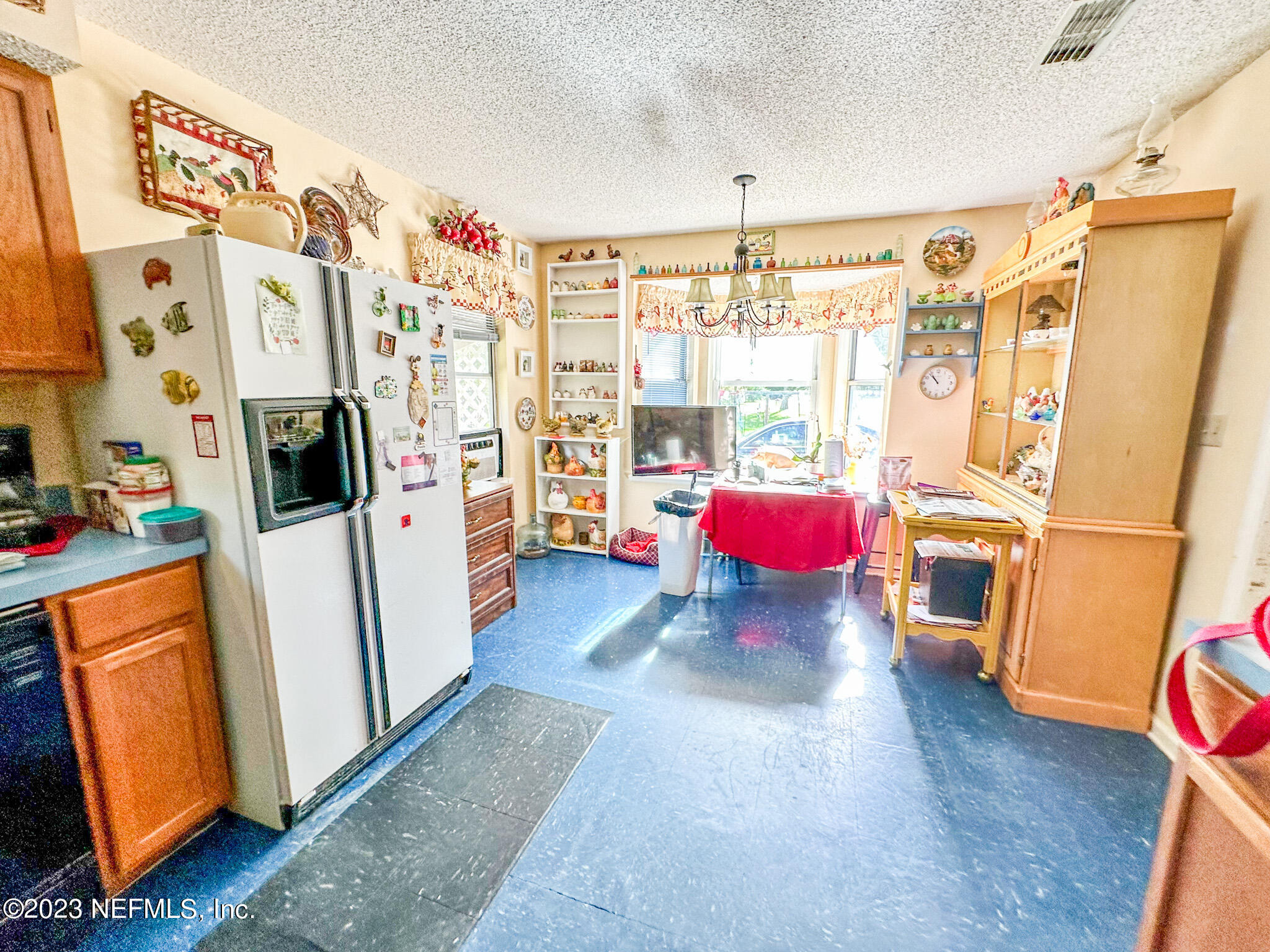 2158 Parental Home Road Jacksonville, FL 32216 - Photo 5 of 18 a living room with furniture and a fireplace