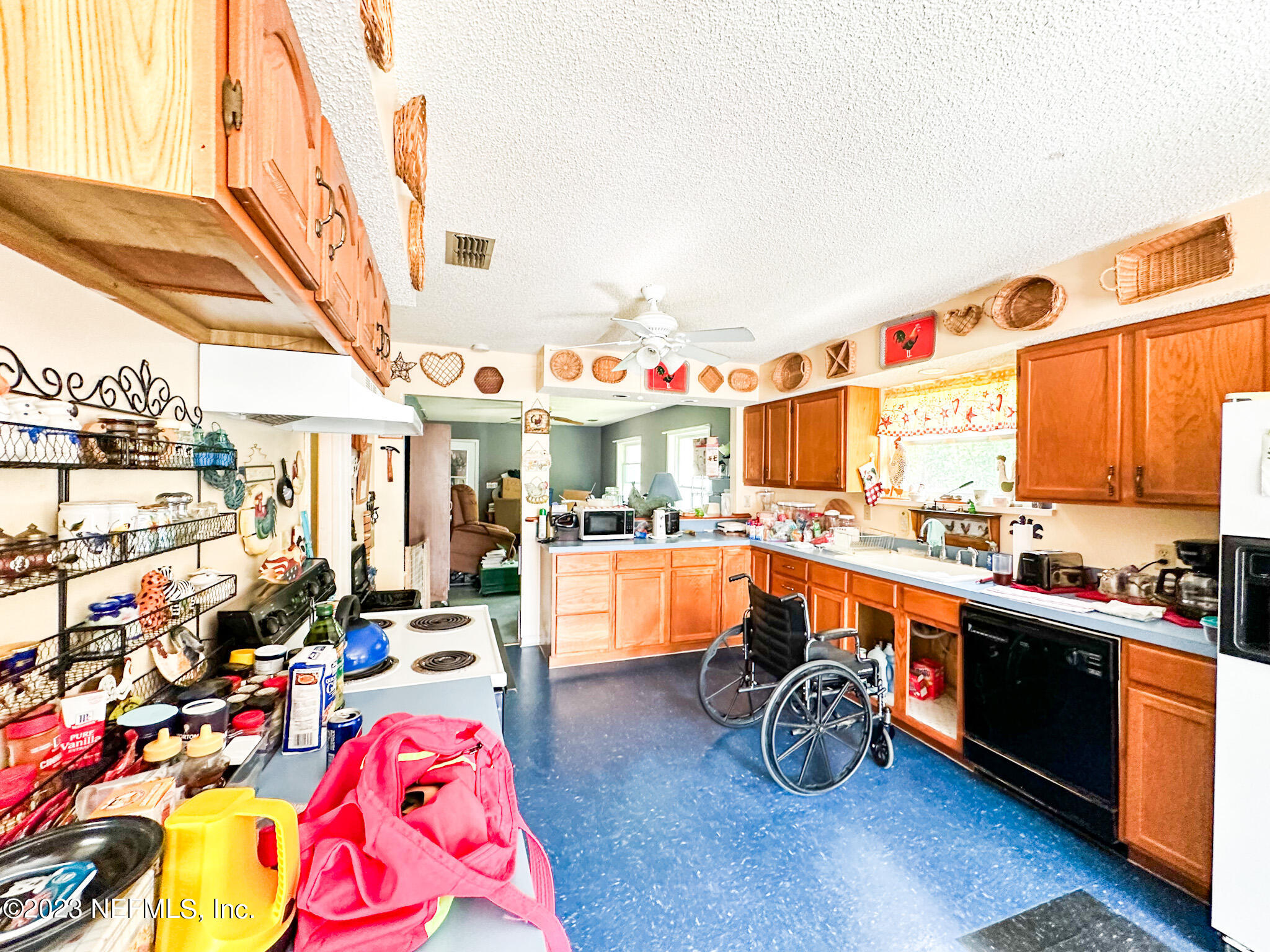 2158 Parental Home Road Jacksonville, FL 32216 - Photo 6 of 18 a very nice looking room with many windows and furniture