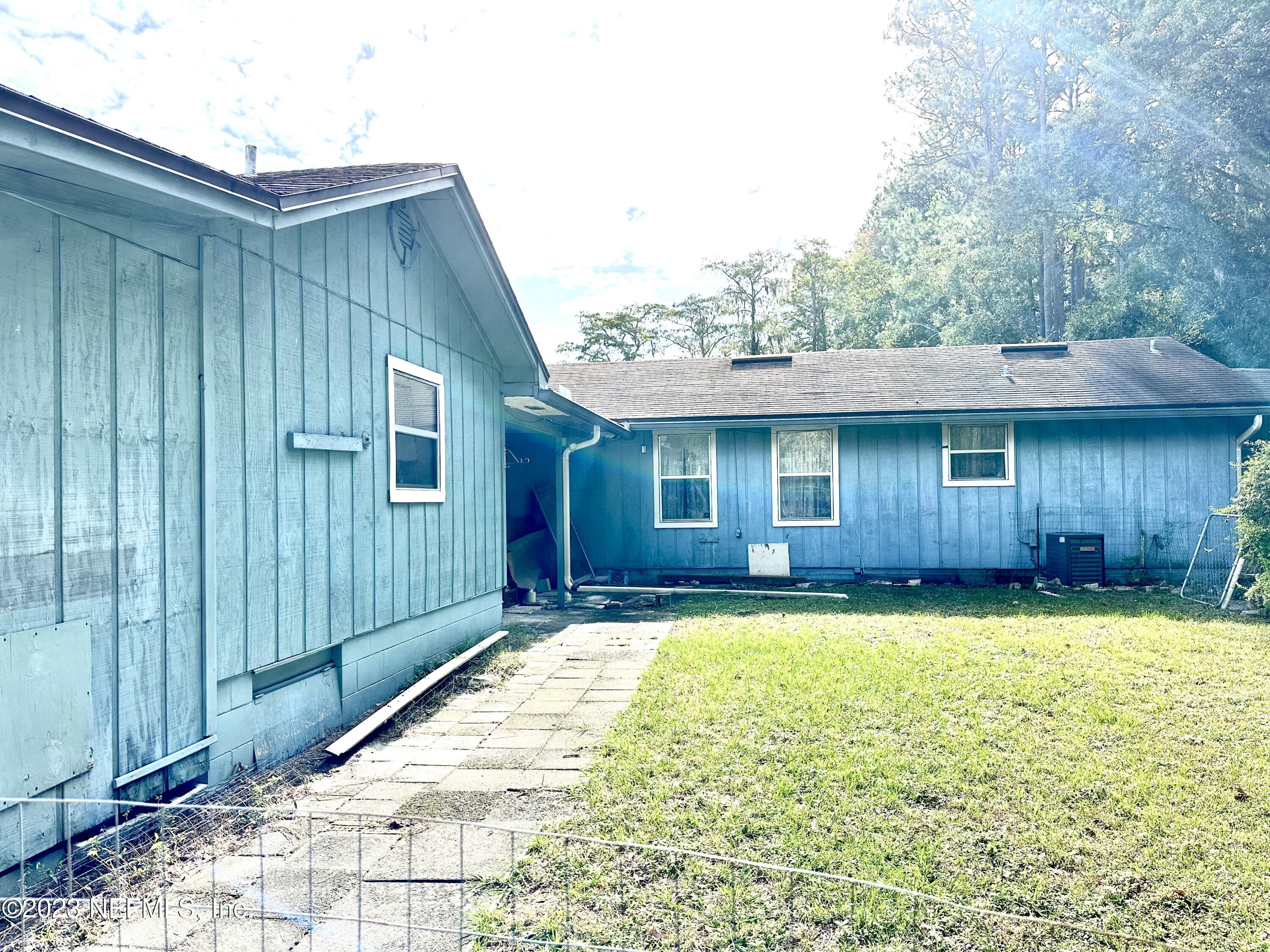2158 Parental Home Road Jacksonville, FL 32216 - Photo 10 of 18 a view of a house with a swimming pool