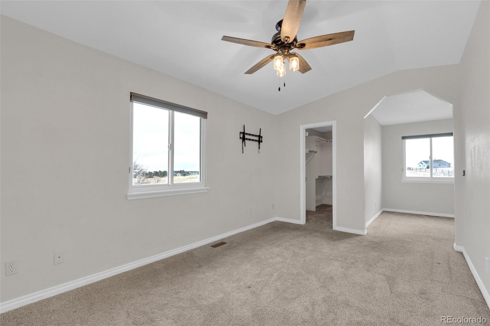 1227 Coronado Road Elizabeth, CO 80107 - Photo 15 of 45 a view of an empty room with a window