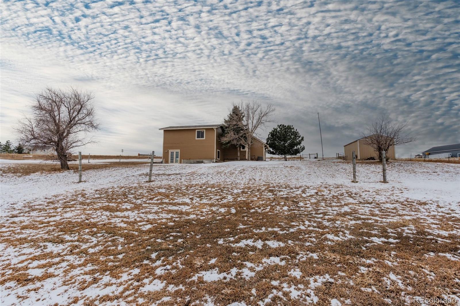 1227 Coronado Road Elizabeth, CO 80107 - Photo 38 of 45 a view of a backyard of the house