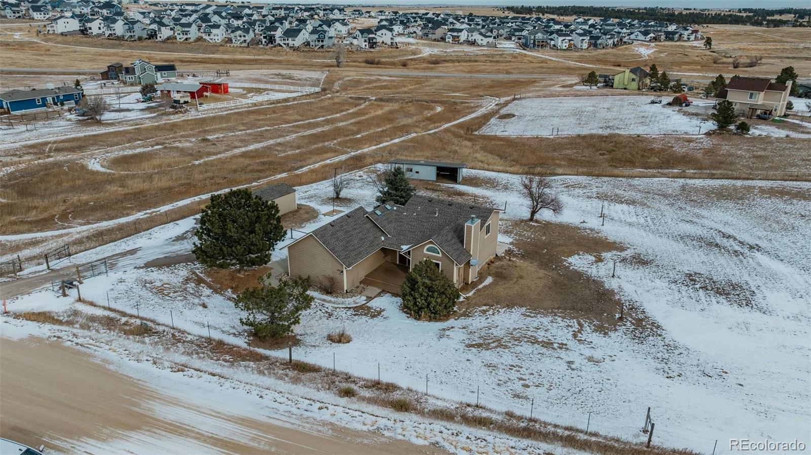 1227 Coronado Road Elizabeth, CO 80107 - Photo 40 of 45 a view of a backyard of a house