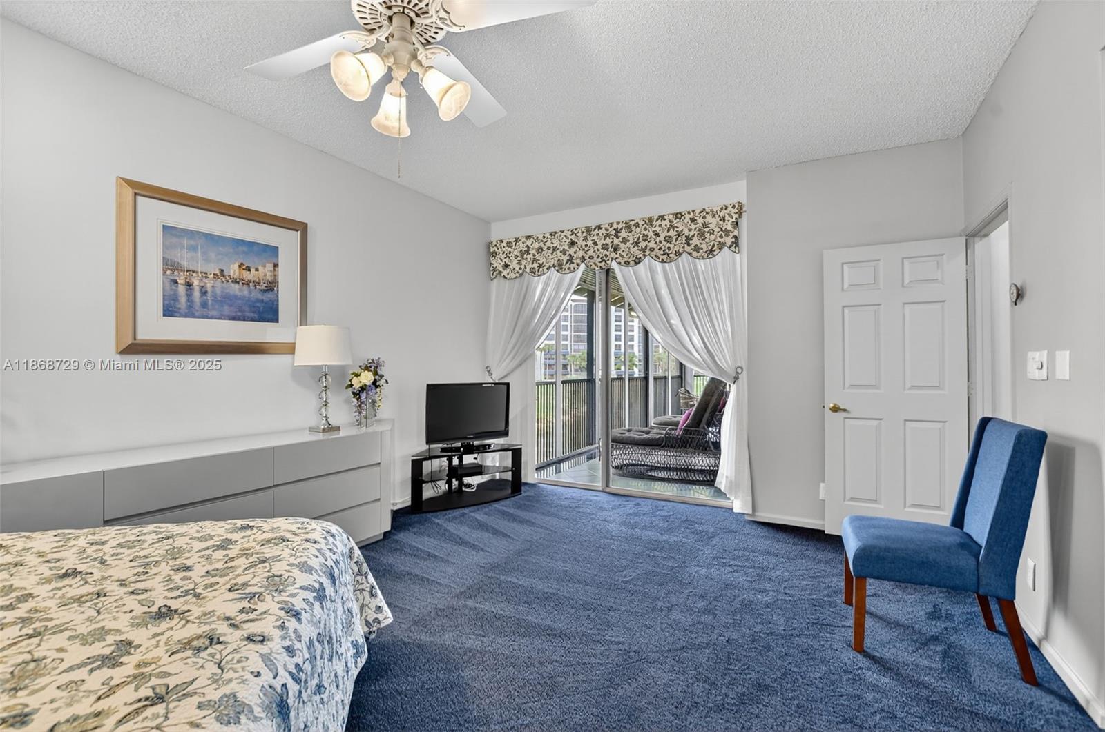 7596 Elm Ridge Drive, Unit 2U Boca Raton, FL 33433 - Photo 18 of 45 a bedroom with furniture and a wooden floor