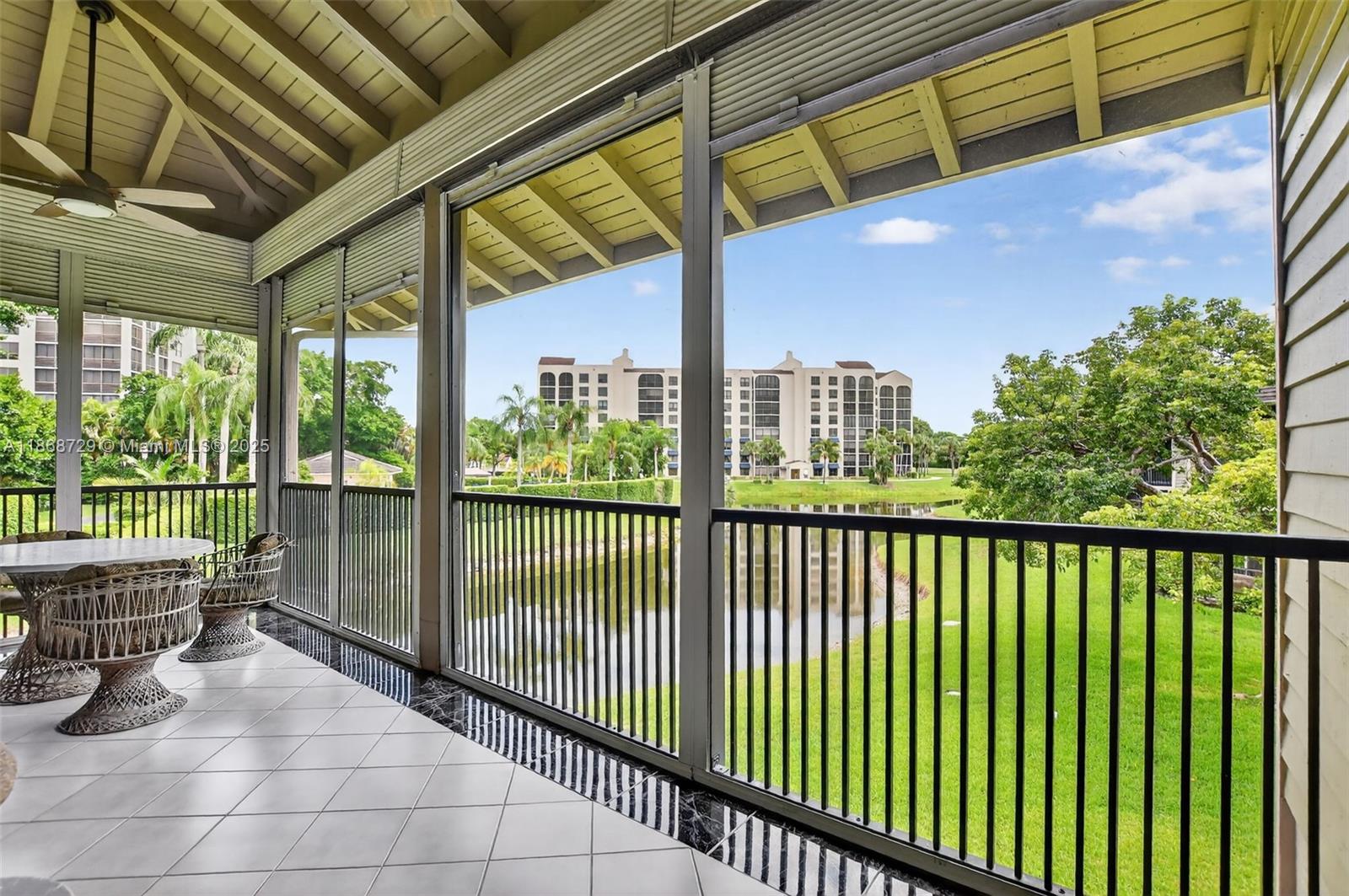 7596 Elm Ridge Drive, Unit 2U Boca Raton, FL 33433 - Photo 28 of 45 a view of balcony with furniture