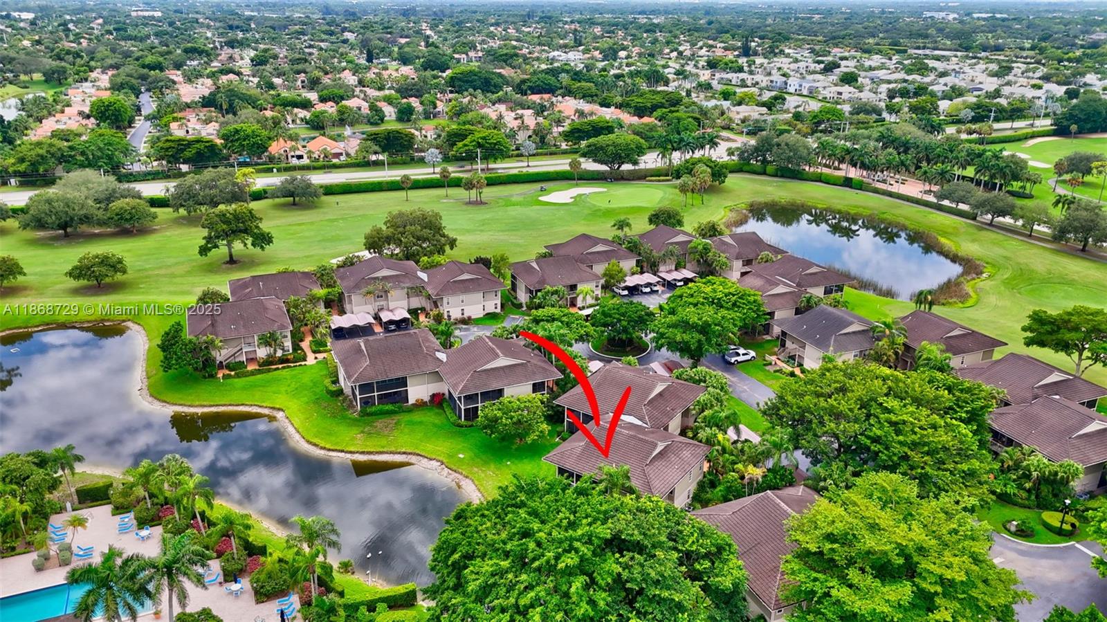 7596 Elm Ridge Drive, Unit 2U Boca Raton, FL 33433 - Photo 40 of 45 an aerial view of a houses with outdoor space and lake view