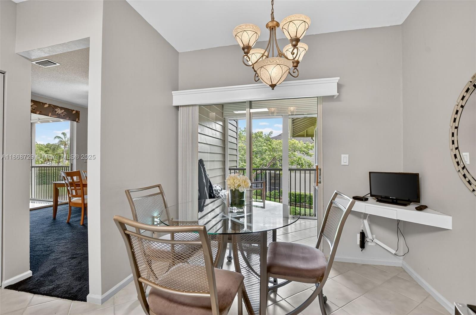 7596 Elm Ridge Drive, Unit 2U Boca Raton, FL 33433 - Photo 7 of 45 a view of a dining room with furniture window and outside view