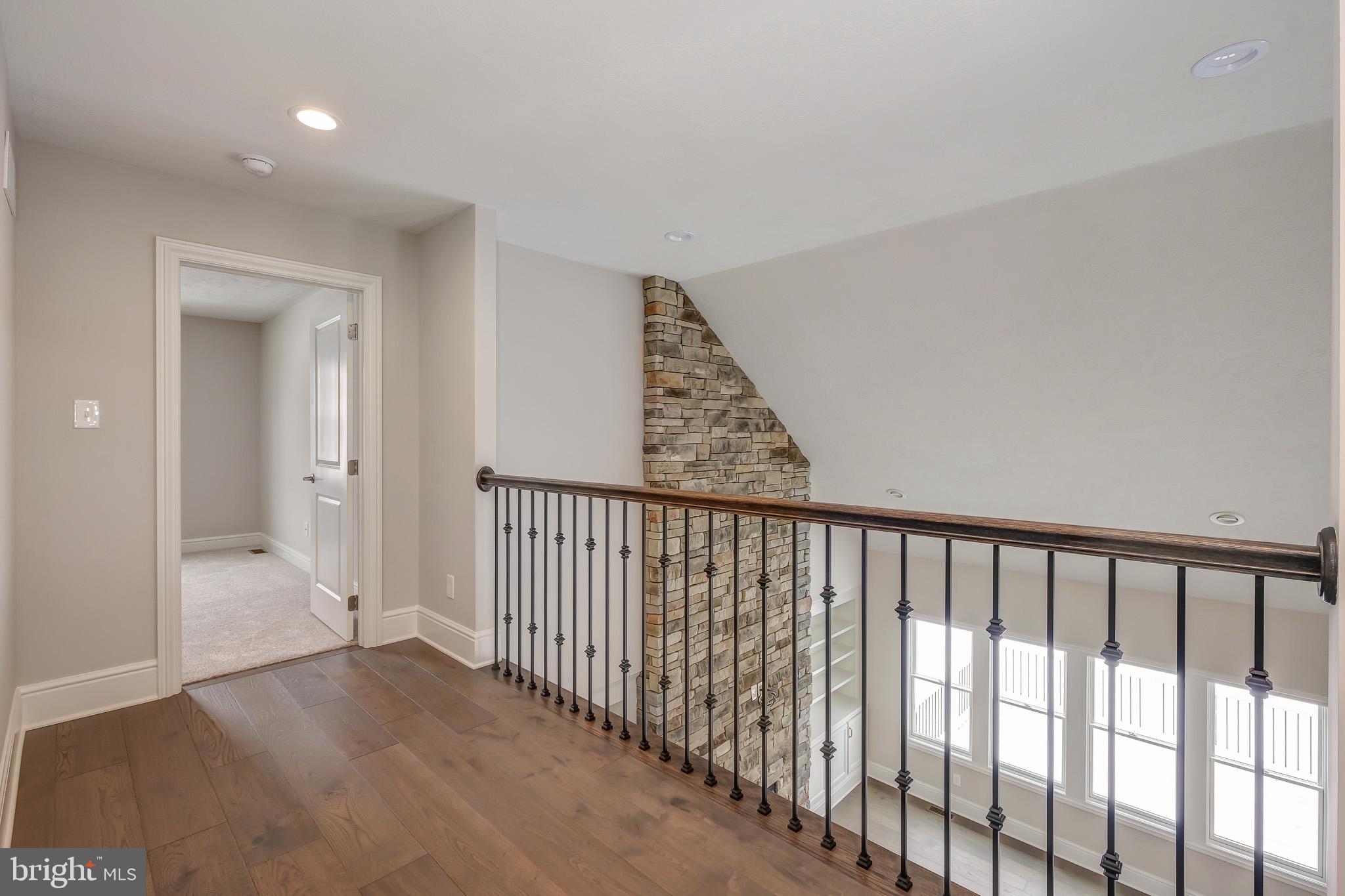102 Harvey Road, Unit 1PS Wallingford, PA 19086 - Photo 15 of 18 a view of a hallway with entryway