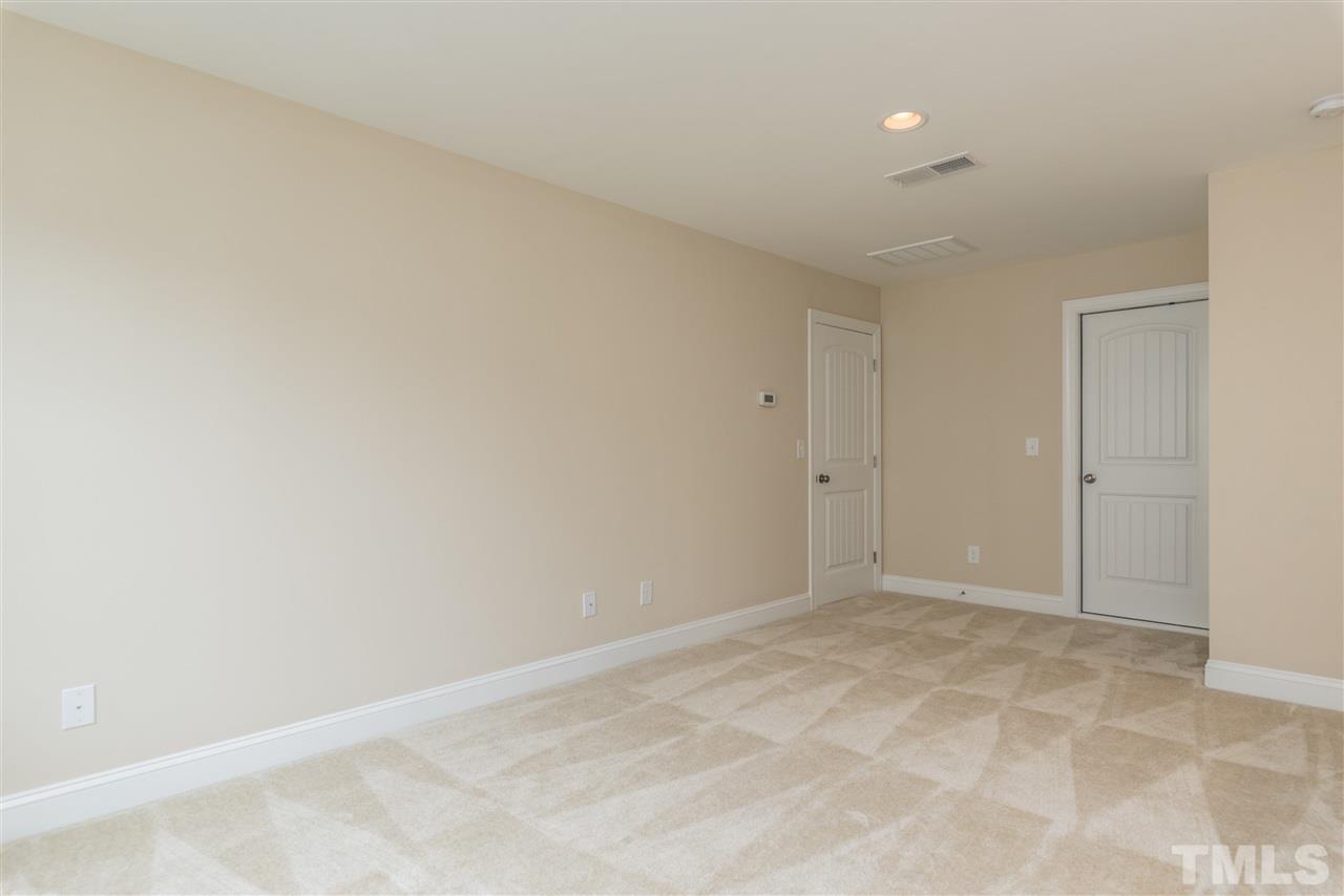 1521 Chestnut Falls Road Wendell, NC 27591 - Photo 22 of 25 Open loft on 2nd floor great for office space, hobby room or private retreat with a full bath. Large walk in storage off the loft area for those things you just gotta keep.