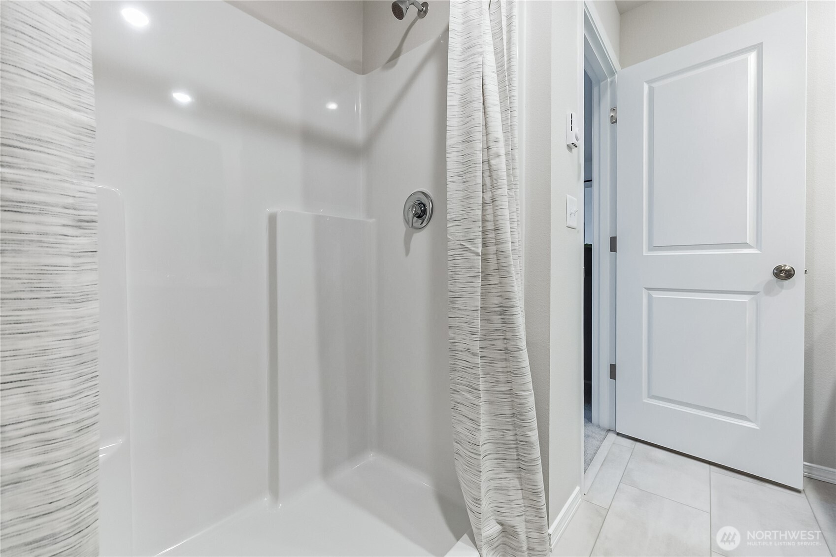 34140 Emerald Ridge Avenue Southeast Black Diamond, WA 98010 - Photo 14 of 24 a bathroom with a shower