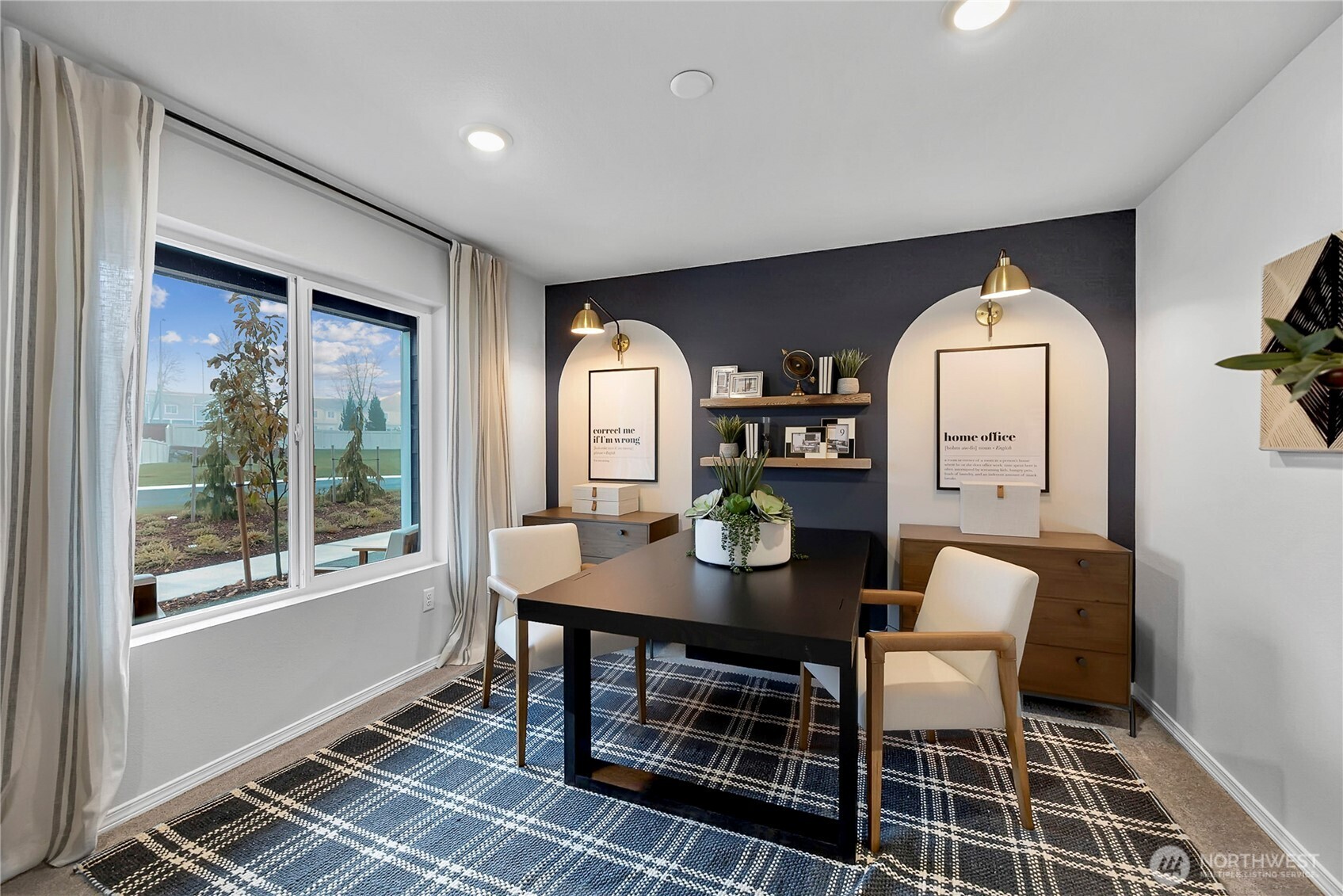 34140 Emerald Ridge Avenue Southeast Black Diamond, WA 98010 - Photo 19 of 24 a view of a livingroom with furniture and window