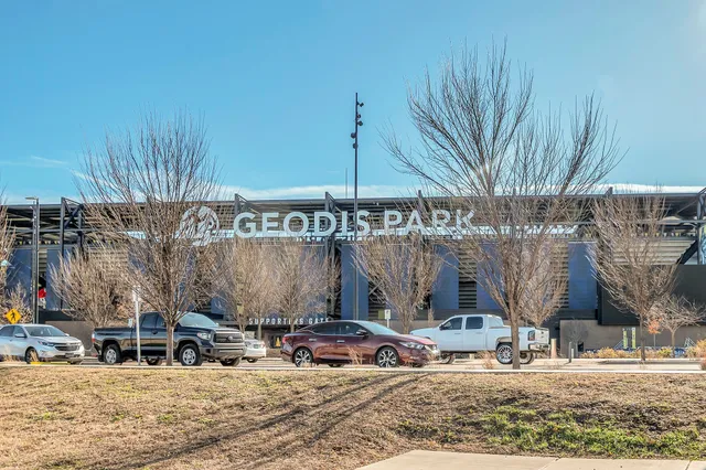 a sign on the side of the road