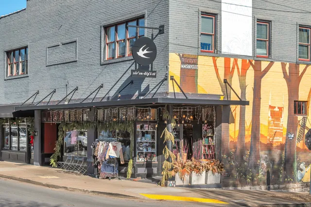 a city street with tall buildings