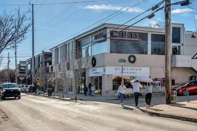 a sign on a brick wall