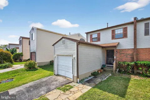 a view of backyard of a house