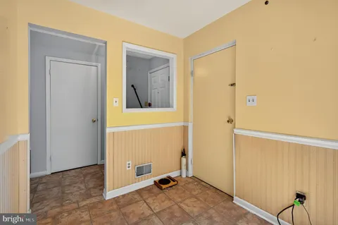 a view of a hallway with closet