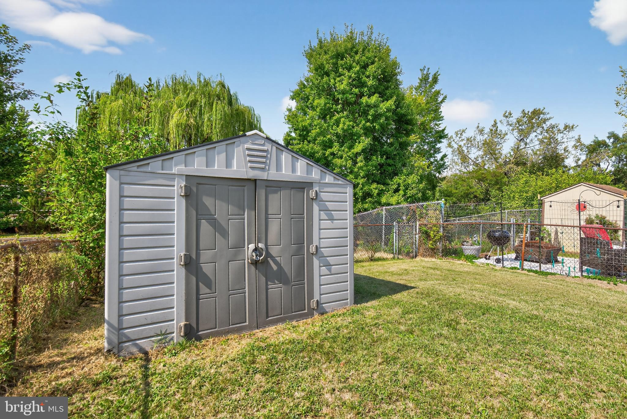 4306 Varnum Place Northeast Washington, DC 20017 - Photo 25 of 31 a front view of a house with garden
