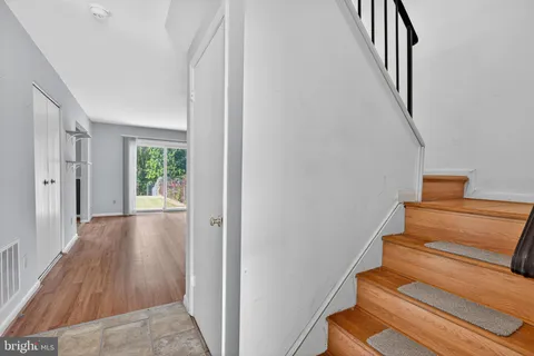 a view of entryway with wooden floor