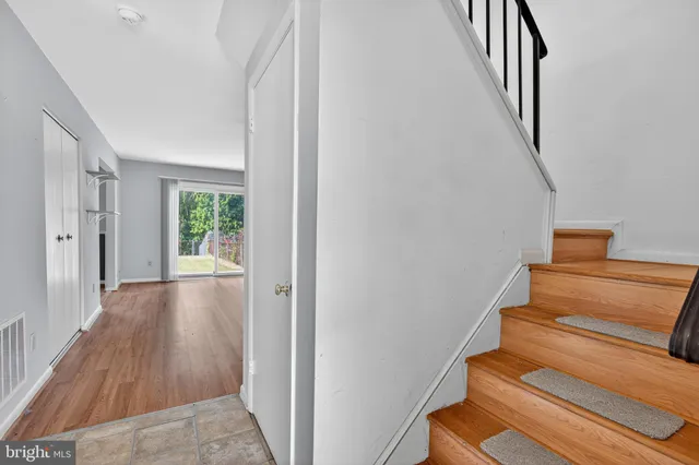 a view of entryway with wooden floor