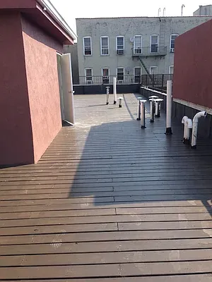 a view of dinning table and chairs on the wooden floor