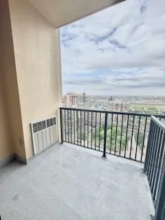 a view of balcony with furniture