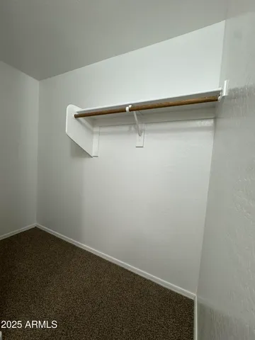 a view of small space with racks on the wall