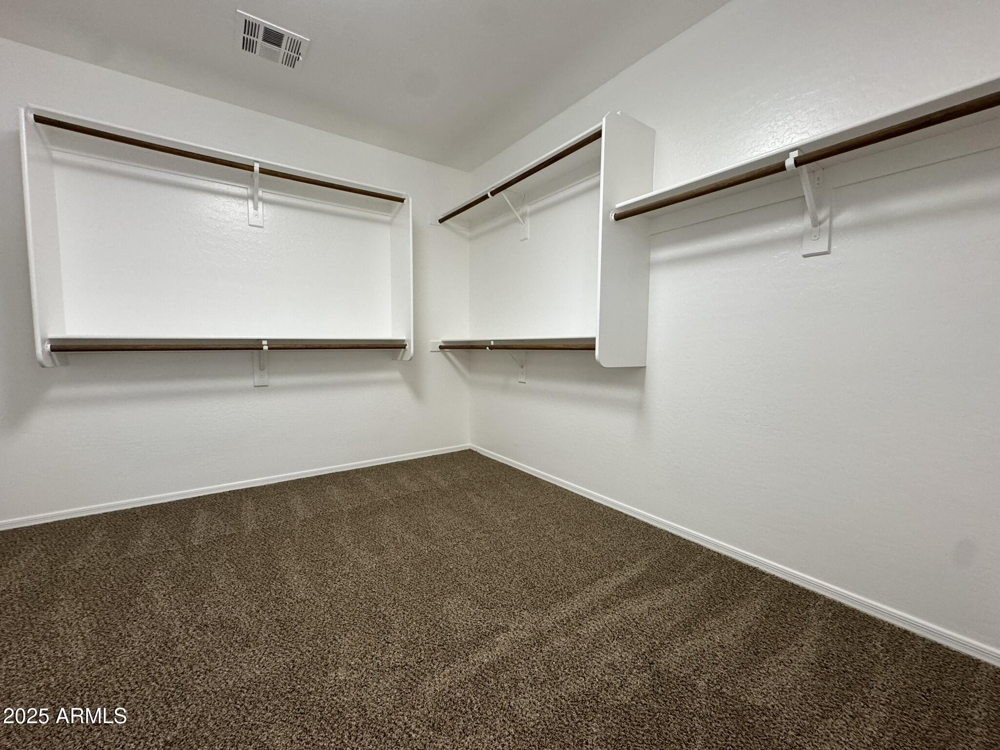 2311 West Hunter Court Phoenix, AZ 85085 - Photo 22 of 24 a view of a room with an empty space