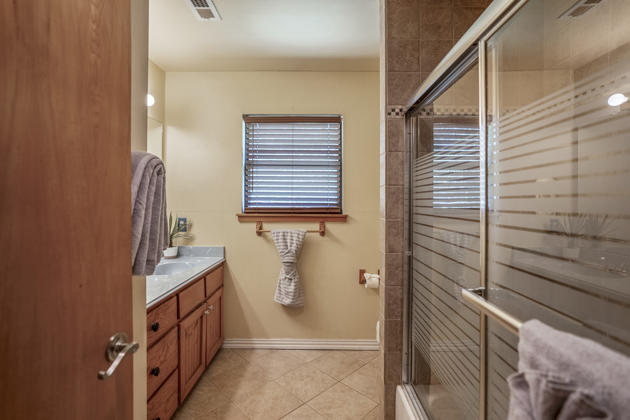 31370 Lazy Ridge Drive Waller, TX 77484 - Photo 26 of 43 a bathroom with a sink and a mirror