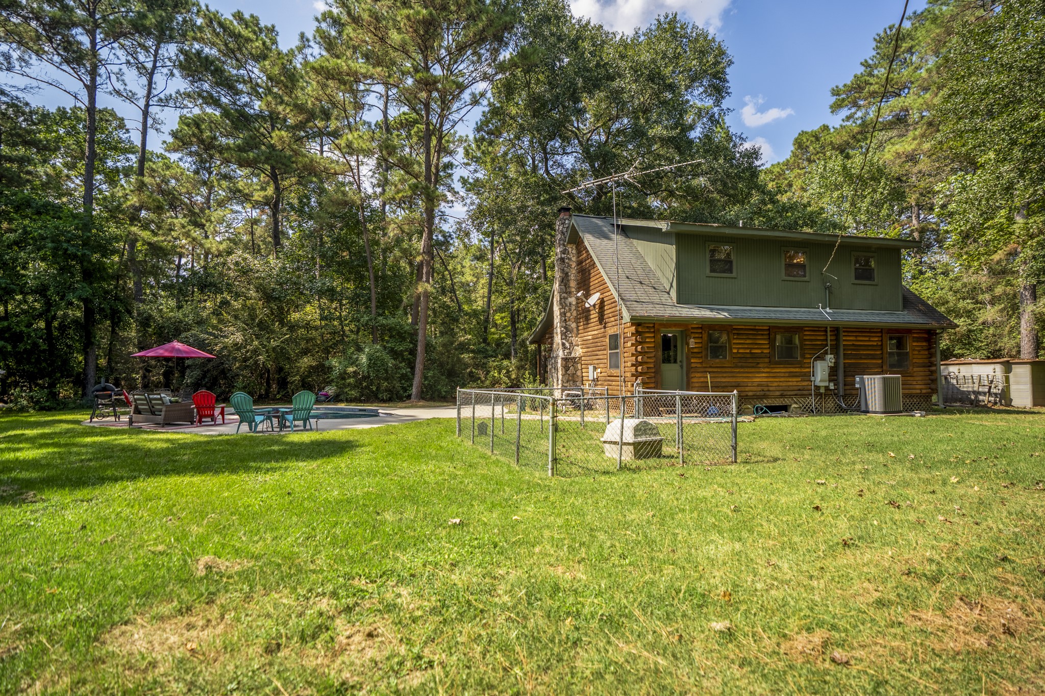 31370 Lazy Ridge Drive Waller, TX 77484 - Photo 41 of 43 a view of a house with a back yard