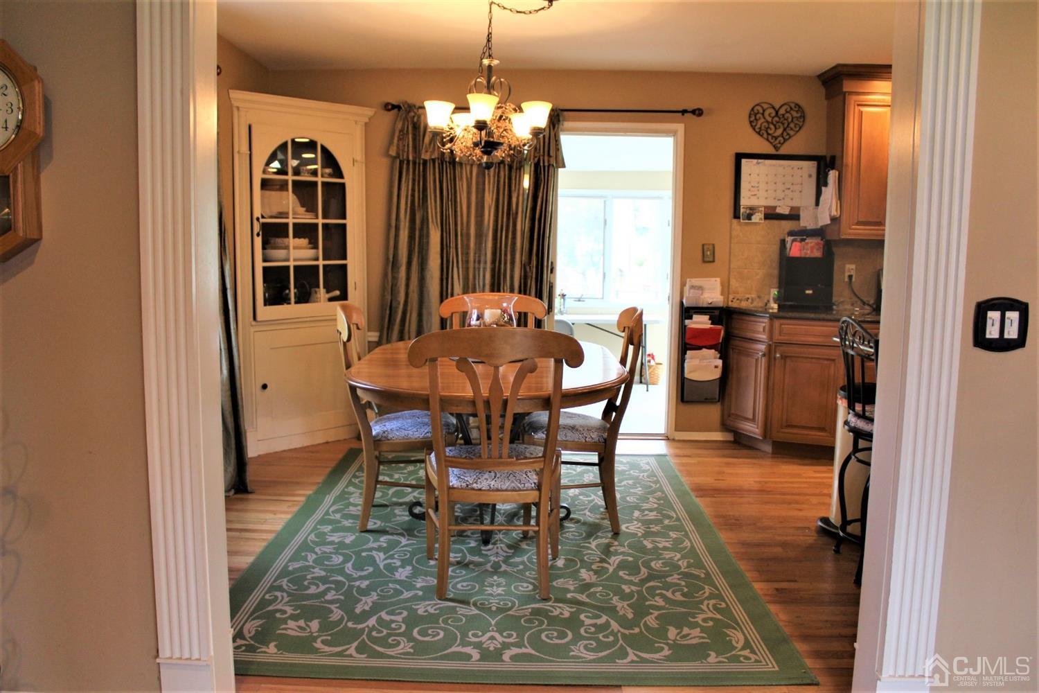 5 Golf Road Edison, NJ 08820 - Photo 8 of 45 a dining room with furniture and window