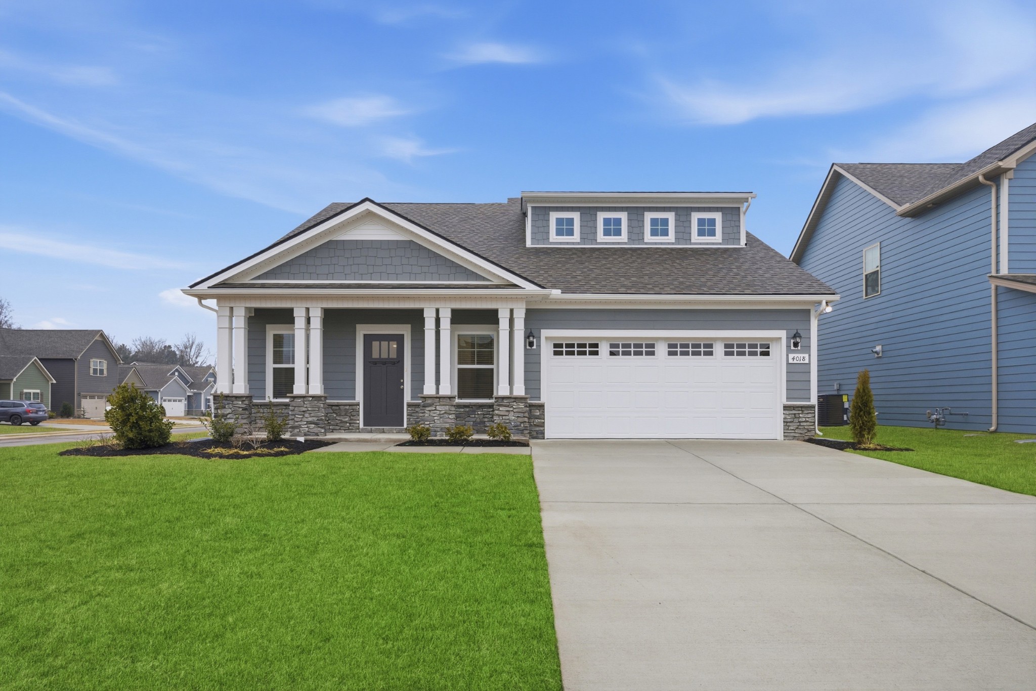 4018 Colleton Lane Rockvale, TN 37153 - Photo 1 of 34 a front view of a house with a yard and garage