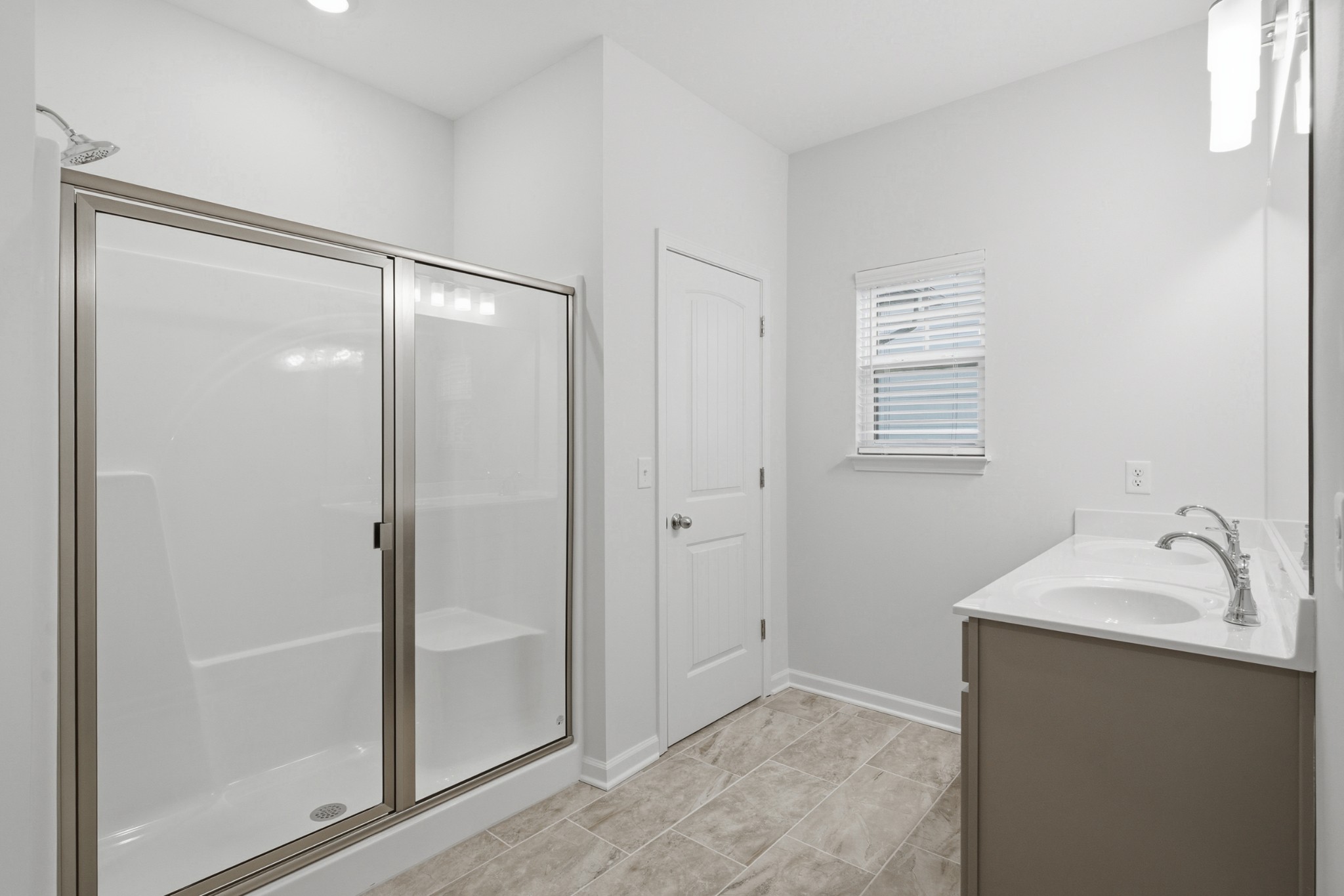 4018 Colleton Lane Rockvale, TN 37153 - Photo 11 of 34 a bathroom with a tub shower and sink