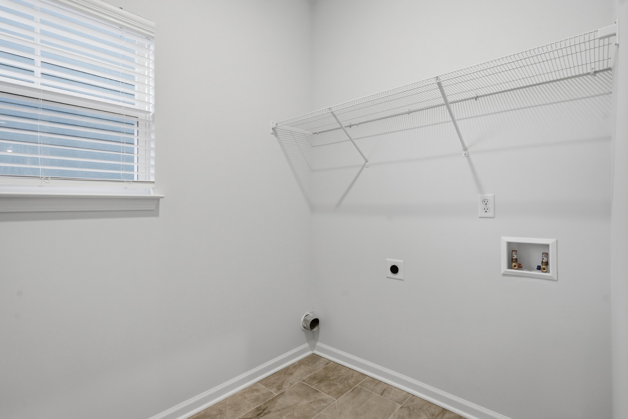 4018 Colleton Lane Rockvale, TN 37153 - Photo 13 of 34 a view of a room with racks on the wall