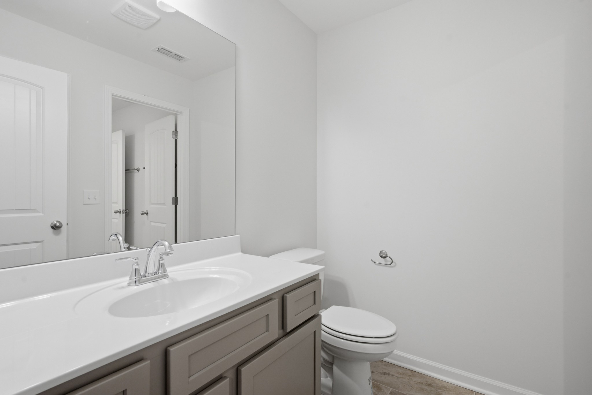 4018 Colleton Lane Rockvale, TN 37153 - Photo 18 of 34 a bathroom with a granite countertop sink a toilet and a mirror