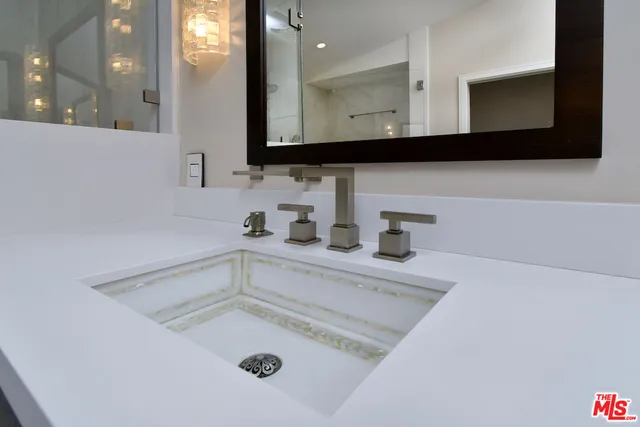 a bathroom with a shower and a fireplace