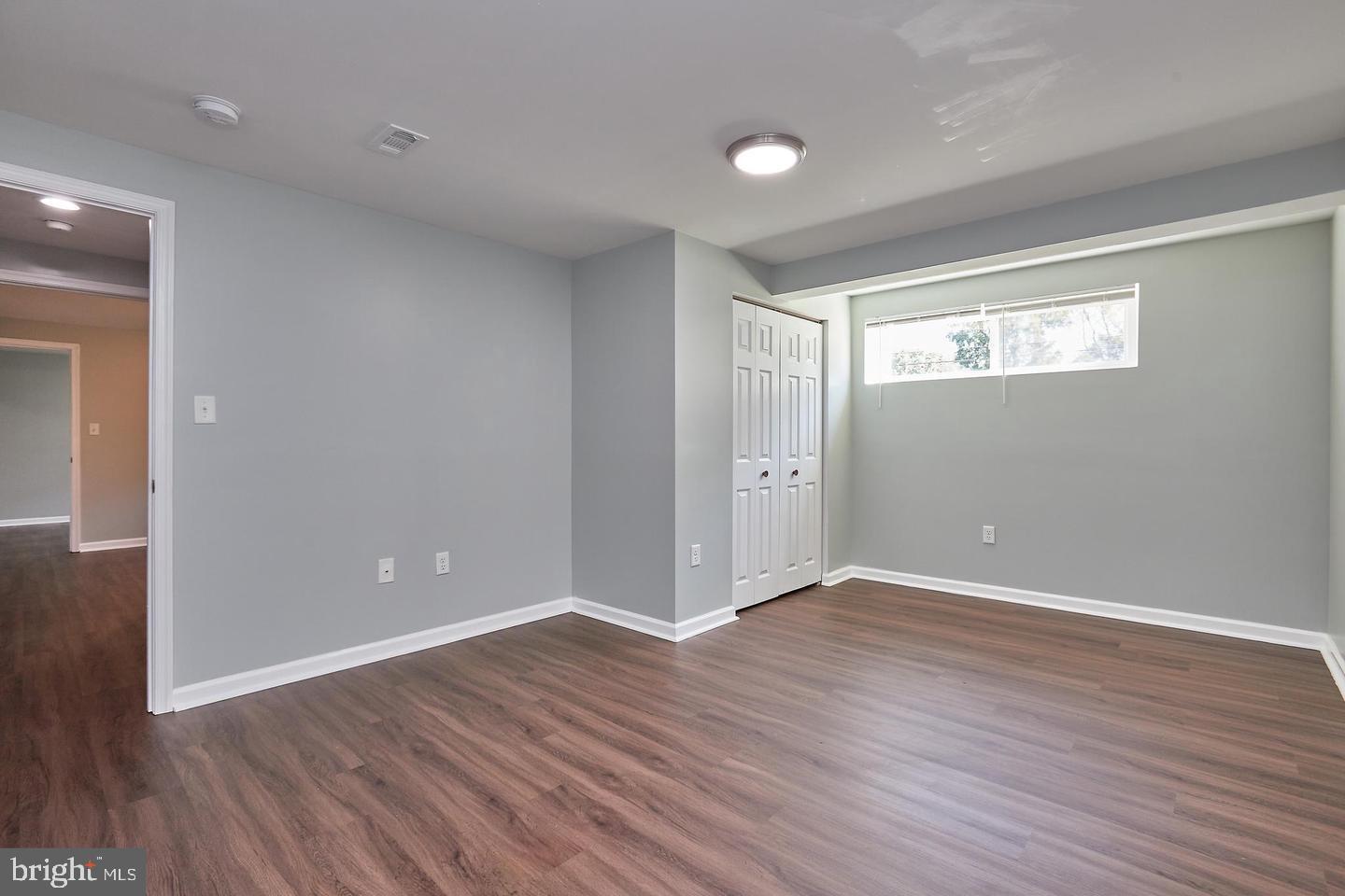 1007 Venice Drive Silver Spring, MD 20904 - Photo 31 of 39 wooden floor in an empty room with a window