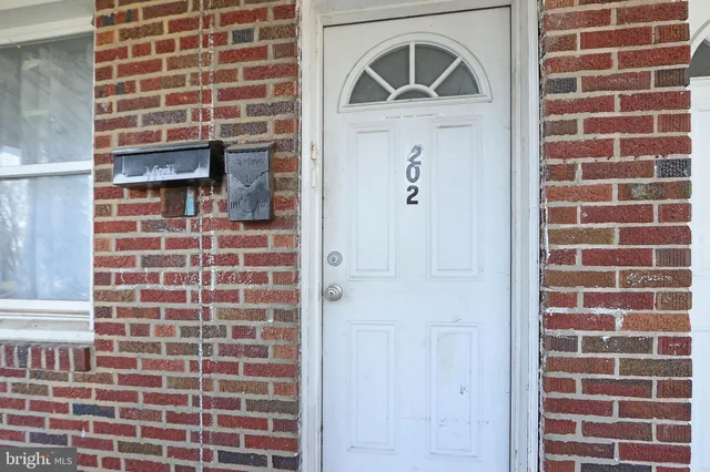 a front view of a building with a door